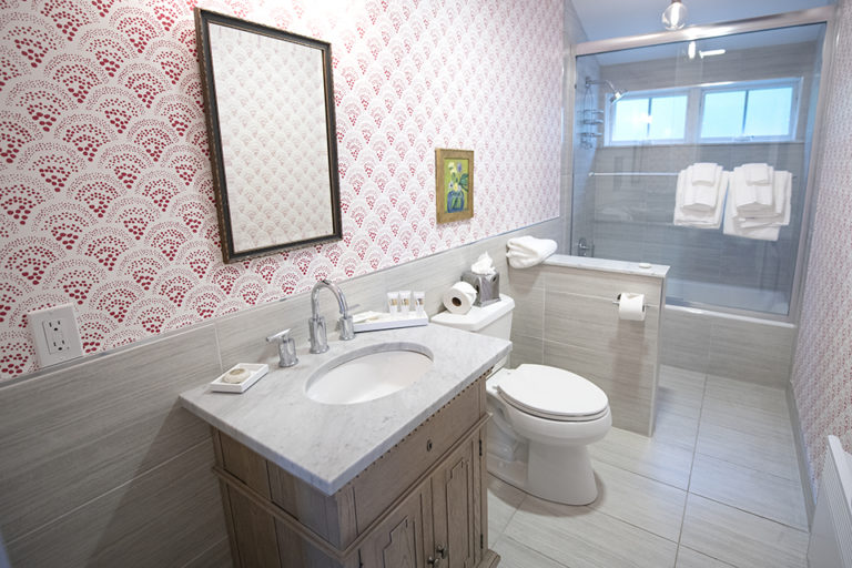 Bathroom with wallpaper in Ocean House